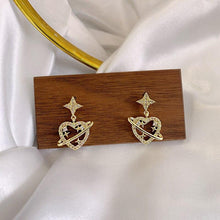 Load image into Gallery viewer, Heart-Shaped Planet Earrings
